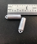 Replacement Clock Weight Set Cylinder Style Kit For DIY Clock Assembly with ruler for size reference.