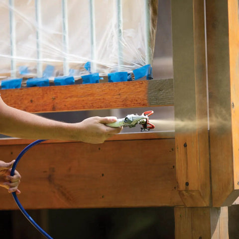 Zero Sweat Heavy Duty Airless Paint Sprayer With Adjustable Pressure Control Spray Unthinned Stains in use on wooden surface.