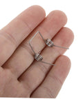 Top Tier Small Compression Springs For Electric Kettles Stainless Steel Coil Kit Universal Size Replacement Ensure Smooth Hot Water Operation With Enhanced Safety and Reliable Performance Right Out Of The Box. small stainless steel kettle switch spring in hand