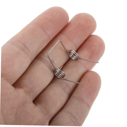 Top Tier Small Compression Springs For Electric Kettles Stainless Steel Coil Kit Universal Size Replacement Ensure Smooth Hot Water Operation With Enhanced Safety and Reliable Performance Right Out Of The Box. small stainless steel kettle switch spring in hand