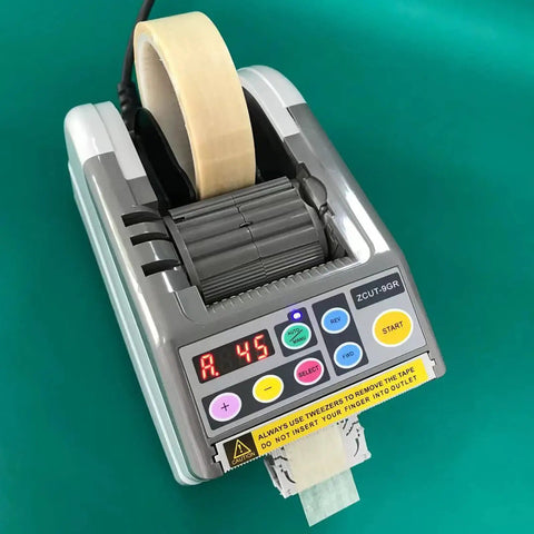 Automatic Tape Dispenser And Heavy Duty Cutting Machine With Bright Led Digital Panel and tape roll in use.