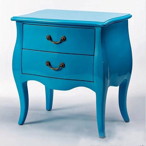 Blue wooden cabinet with two drawers and bronze handles on white background