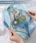 Go To Travel Toiletry Bag For Women And Men, Matte Translucent Organizer With Handy Handle, Waterproof PVC Makeup Case For Skincare, Cosmetics, Toiletries And Travel Essentials, Ultra Large Capacity, Blue with spacious storage filled with travel essentials.