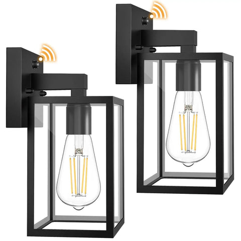 Two Pack Dusk To Dawn Outdoor Wall Lanterns With Automatic Sensor For Front Porch And Garage Waterproof Black Exterior Lights, showing black frame and sensor.