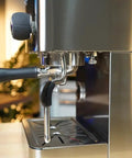 Close-up of Top Tier Dual Boiler Espresso Maker With Smart Thermoblock And Precise PID Temp Control, featuring 58mm portafilter in stainless steel.