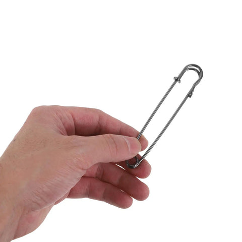 Premium Heavy Duty Safety Pins And Weatherproof Retro Brooches Perfect For Jackets Hats And Industrial Projects With Precision Opening Mechanism To Keep Everything Secure Anywhere, held in hand.