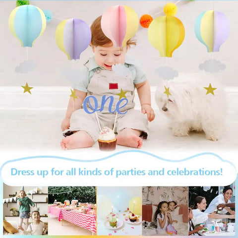 Baby with cupcake and dog under Colorful Hot Air Balloon Paper Garland Set 5 Pieces For Room Party Decor With Clouds And Stars.