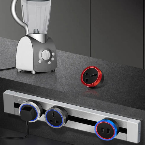 Sleek Concealed Power Track Socket Offering Four Dedicated Plug Outlets For Lowkey Kitchen Counter Organization And Modern Home Electrical Flexing Heavy Duty Sandblasted Aluminum Finish with blender.