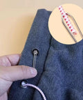 Upgraded DIY Rope Threader Clip Set with stainless steel hooks and latch threading drawstring through a hoodie.