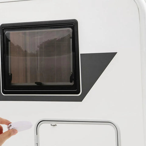 Must-Have White Stainless Steel And Abs Baggage Door Catch Clip For Rv Trailer Camper shown securing a baggage door on a camper.