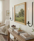 Super Rock Solid Iron Wall Candle Sconces Set Of Two Matte Black Metal hanging mount on wall beside art.
