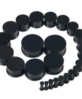 Soft Silicone Ear Gauge Kit 13 Pairs 26 Pieces From 3mm To 25mm Flexible Tunnels Plugs Set arranged in circle
