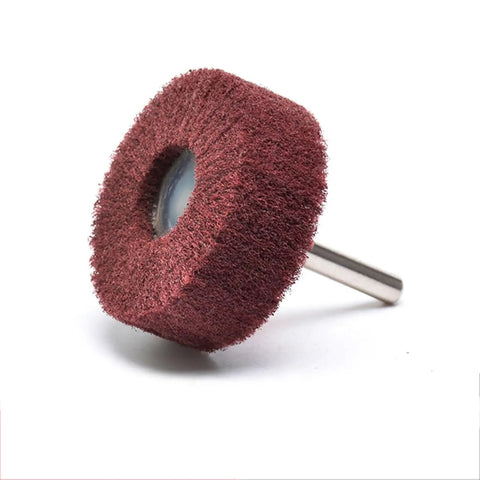 Close-up of a non-woven buffing wheel with shank from the Complete 4-Piece Non-Woven Buffing Wheel Set For Drills With 120 180 320 600 Grit Polishing Wheels For Metal Wood Plastic, One Quarter Inch Shank, Fits Angle Grinders, Durable Abrasive Buffing Pads For Smoothing And Shaping