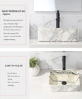 16 X 12 Inch Black And White Marble Vessel Sink And Faucet Combo For Modern Bathrooms with sleek black faucet on ceramic vanity
