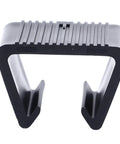Close-up of a black plastic outdoor patio furniture clip from the 8 pack for sectional sofas and rattan couches.