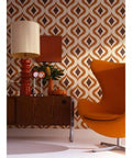 Trippy Orange Wallpaper for Retro Vibes Paste The Wall Non Woven Washable Finish with 12 Inch Pattern Repeat and Offset Match displayed in a living room with retro furniture and decor.