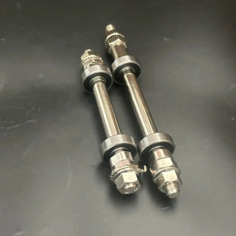 Close-up of Rugged Bicycle Axles With Bearings 140mm And 182mm Front And Rear Hub Kit Two Pack, alloy and steel blend