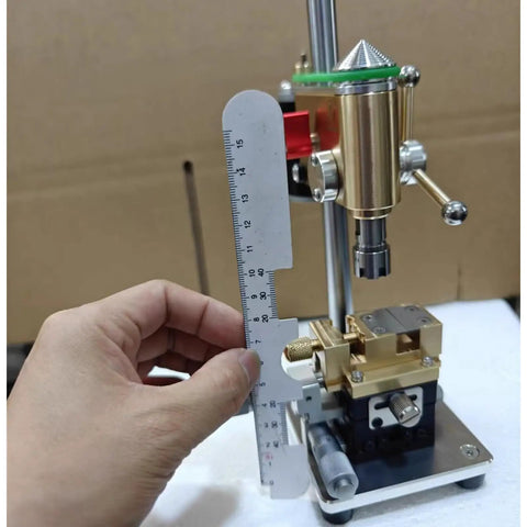 Hand measuring Joverex Multifunction Micro Watch Bench Drill Press With Adjustable Voltage And Variable Speed Up To 9500Rpm tool components.
