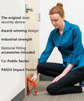 Woman demonstrating Portable Door Lock Brace For Inswinging Doors With 3Mm Clearance Industrial Strength Security Barrier