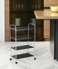 4pcs Inch Plastic Swivel Caster Wheels Replacement for Desk Chair on a black metal rolling cart with four shelves.