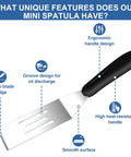 Front view of stainless steel slotted spatula with a black ergonomic handle for kitchen use.