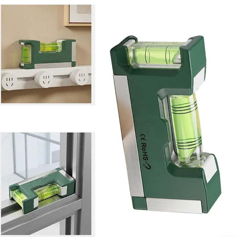 Compact Magnetic Bubble Level 83mm Accuracy for spirit Level for Woodworking Plumbing Metal Surfaces Silver on a shelf and window