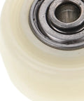 Top Notch 4 Pack 1.5 Inch Nylon Caster Wheels showing detailed view of beige nylon wheel with metallic bearing.