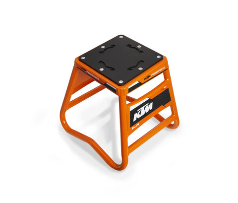 Matrix A2M Mini Bike Stand for 50 65 85 Models With Aluminum Construction Non Slip Pad and Wedge Top Keeps Your Bike Secure While Washing Orange Finish, side view