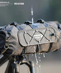 Ride-Ready Waterproof Handlebar Bag 12L Roll-Top Dry Bag With Front Panel And Removable Harness shown on bike in the rain