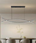 Lit Linear LED Pendant Light With Dimmable Stepless Control in dining room setting, modern curved chandelier above table.