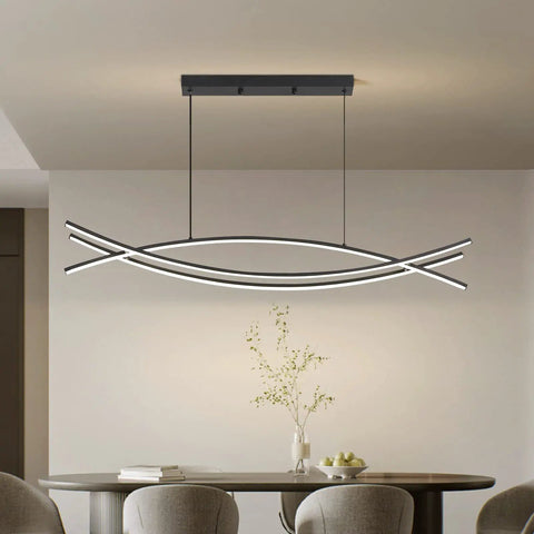 Lit Linear LED Pendant Light With Dimmable Stepless Control in dining room setting, modern curved chandelier above table.