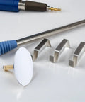 Copper Bathtub Drain Stopper with Rotary One Press Sealing shown with metal installation tools and fittings on a white surface.