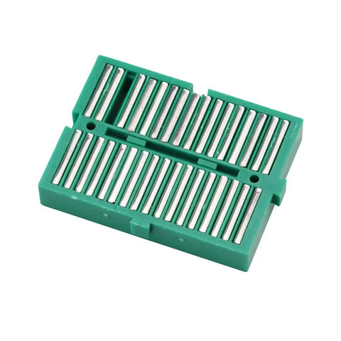 Green seven pack mini solderable breadboards with 170 tie points each, interlocking design for Arduino shield projects solderless kit
