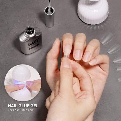 Applying Two In One Nail Glue And Base Gel For Acrylic Tips 16ml UV Light Cure In Sixty Seconds using UV light for press-on nails.