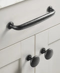 Weathered Nickel Drawer Handles Six Pack With 5.04 Inch Center To Center Antique Iron Cabinet Pulls installed on white cabinet