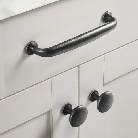 Weathered Nickel Drawer Handles Six Pack With 5.04 Inch Center To Center Antique Iron Cabinet Pulls installed on white cabinet