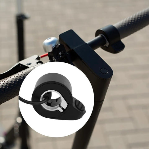 Close-up of Electric Scooter Throttle Thumb Accelerator Replacement For Xiaomi M365 E Scooter Accessories mounted on handlebar