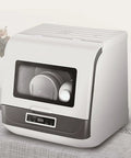 Portable Countertop Dishwasher For Busy Households Featuring Four Cycle Settings And Turbo Hot Air Dryer with dishes visible.
