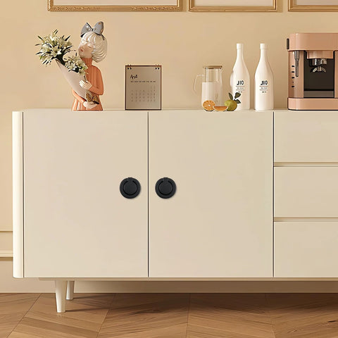 Four Pack Matte Black Recessed Ring Pull Handles For Cabinets And Drawers installed on white cabinet doors