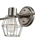 Close-up of the Cedrick 3 Light Track Lighting in Brushed Nickel with vintage Edison bulb and wire cage on adjustable head.