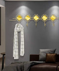 Top Shelf Wall Mounted Coat Rack With Five Heavy Duty Wrought Iron Hooks That Handle Every Jacket Key Backpack And Towel Without A Hitch While Adding A Smooth Modern Vibe To Your Entryway Organization Game with a white scarf displayed.