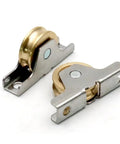Four Pack V Groove Sliding Door Rollers Copper Cabinet Casters Heavy Duty Furniture Pulleys with brass wheels and steel frame.