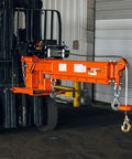 Heavy Duty Fork Mounted Jib Crane With Electric Winch Pivoting Telescopic Boom Extends To 138 Inches Wireless Remote attached to forklift