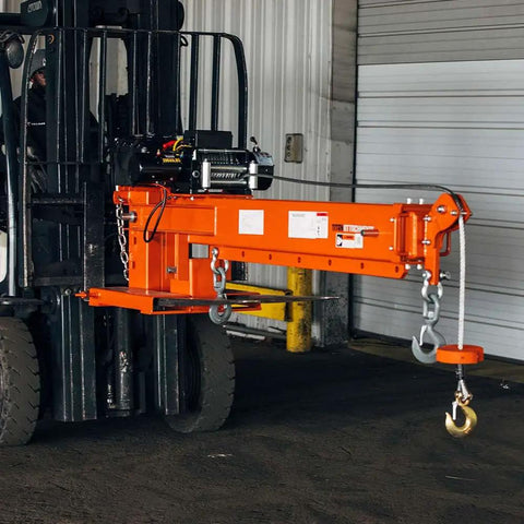 Heavy Duty Fork Mounted Jib Crane With Electric Winch Pivoting Telescopic Boom Extends To 138 Inches Wireless Remote attached to forklift