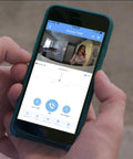 Person using smartphone app for Indoor Home Security Camera With 360 Degree Pan, 1080P HDR, Super Wide Angle, Color Night Vision