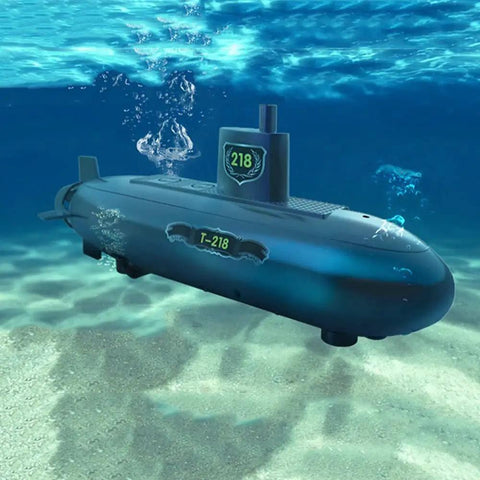 Mini RC Submarine With 2.4GHz Remote Control Six Channel Sub Boat underwater in a pool featuring multicolour hull.