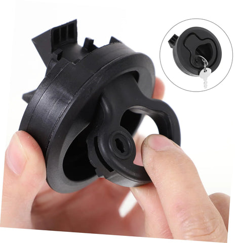 Close-up of black plastic flush pull boat latch with locking mechanism; inset shows key.