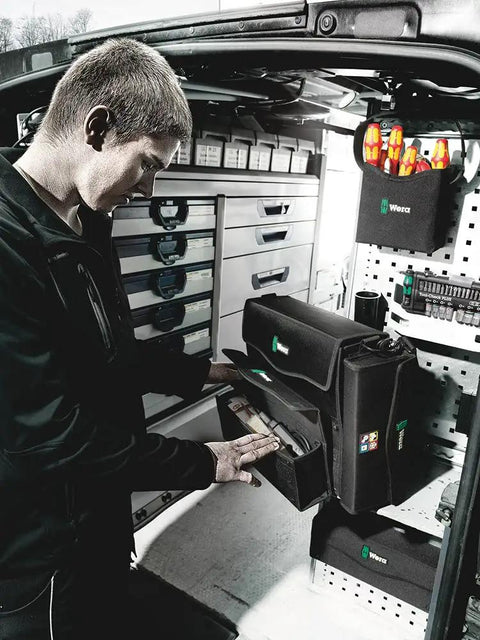 Person organizing tools with 2Go 3 Tool Box Grab And Go Portable Tool Organizer Case For Bits And Drivers in a work van.