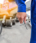 Heavy Duty 4 Way Sillcock Key Socket Wrench Set for Quick Faucet Valve Repairs held by worker in blue coverall.