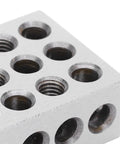 Close-up of Pro Grade 1 2 3 Block Set With 23 Holes For Ultra Precision Machining Finishing Clamping And Fixturing Heavy Duty Tool Steel Construction